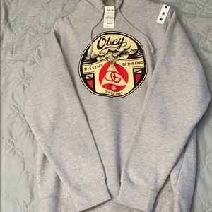 Medium Grey Obey sweater w/ graphic design